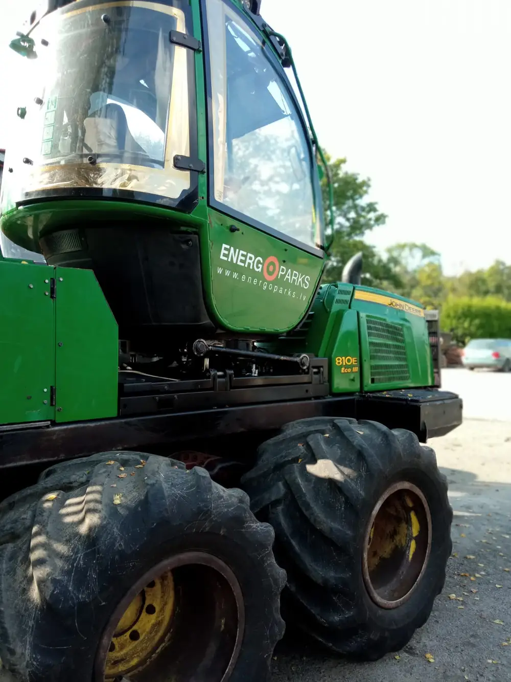 Green forestry machine with Energoparks lettering on the cab doors