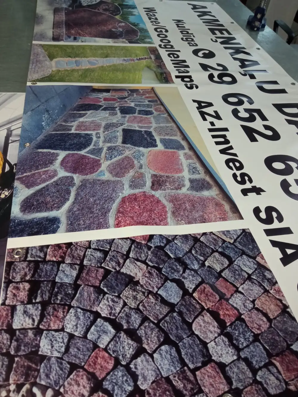 Banner with paving stone photos, a phone number and the text AZ-Invest SIA