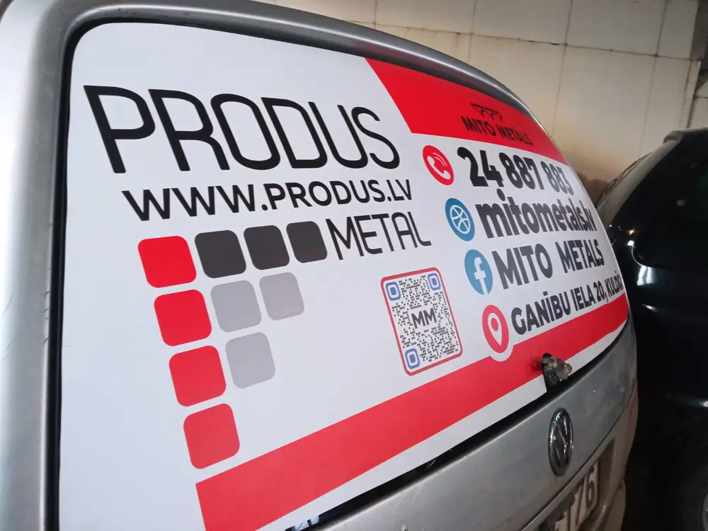 Van rear window with Produs Metal lettering, contact details and a QR code